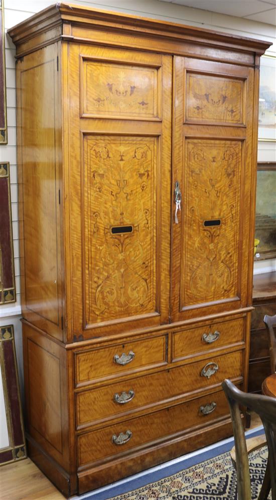 A satinwood armoire W.132cm